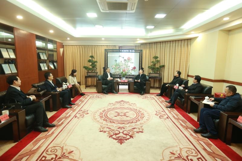 公司董事长蒋刚带队赴金牛区交流座谈